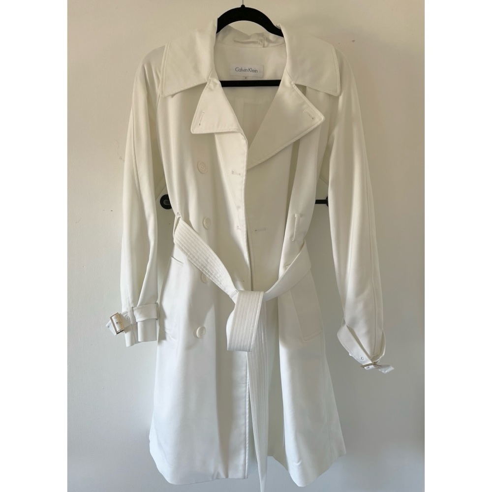 Beautiful, white Calvin Klein trench. Rarely used/like new. Size is medium.